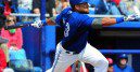 Latin player Melky Cabrera connects for a base hit.