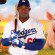 Yasiel Puig holds a bat on his shoulder in a composite image with the animals from the film Babe.