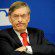 Bud Selig staring with arms crossed.