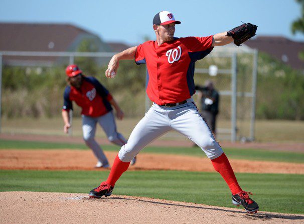 Washington Nationals pitcher Stephen Strasburg pitches batting practice in spring training.