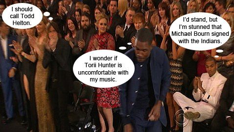 Image of Frank Ocean going on stage at the Grammys with funny thought bubbles above Ocean, Chris Brown and Keith Urban.