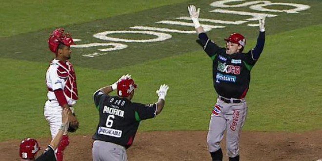 Doug Clark approaches home plate after his home run gave Mexico the Caribbean Series title.