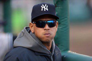 Alex Rodriguez wears shades in the Yankees dugout.