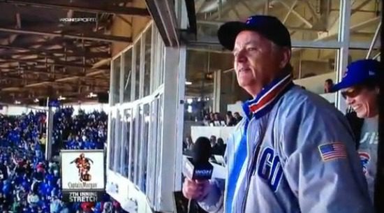 Bill Murray prepares to sign the Wrigley Field seventh-inning stretch tradition of Take Me Out to the Ball Game.