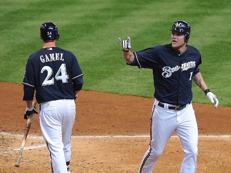 Mat Gamel and Corey Hart at home plate during a Milwaukee Brewers game last season.