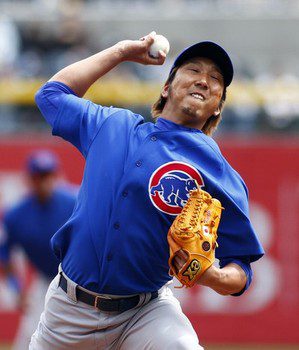 Chicago Cubs pitcher Kyuji Fujikawa throws a pitch.