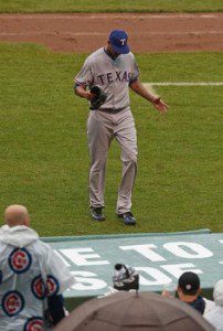 Texas Rangers pitcher Alexi Ogando leaves the game in disgust. 