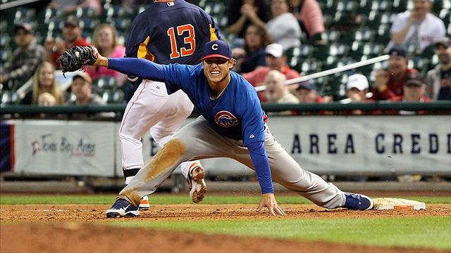 Theo Epstein's new million-dollor prize, Anthony Rizzo, stretches to catch a ball at first base.