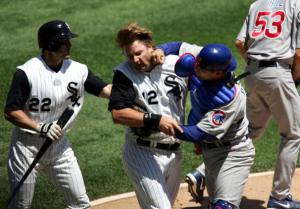 Michael Barrett of the Chicago Cubs punches A.J. Pierzynski of the Chicago White Sox.