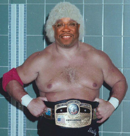 Composite image of wrestler Dusty Rhodes with Dusty Baker's face.
