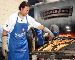 Andre Ethier grilling hot dogs.