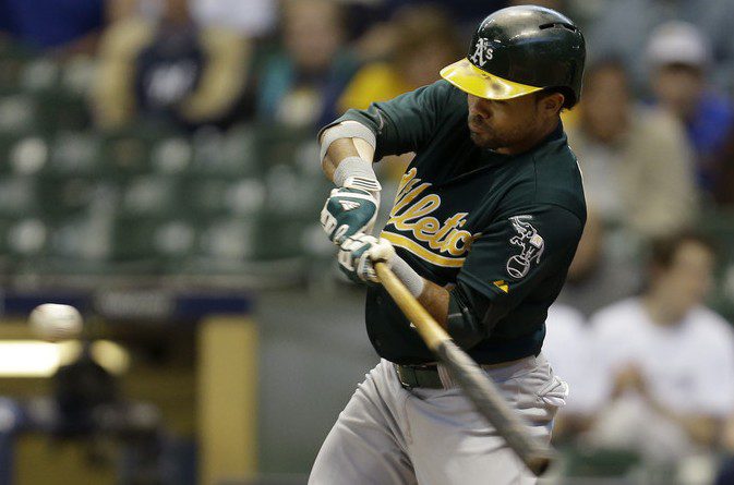 Coco Crisp swings and connects against the Brewers.
