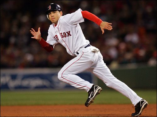 Jacoby Ellsbury in mid stride as he steals second.