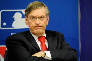 Bud Selig staring with arms crossed.