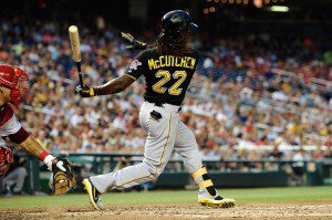 Andre McCutchen watches the ball after it leaves his bat. 