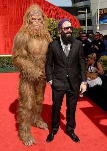 Brian Wilson, who was signed by the Dodgers, is joined by Sasquatch on the red carpet. 