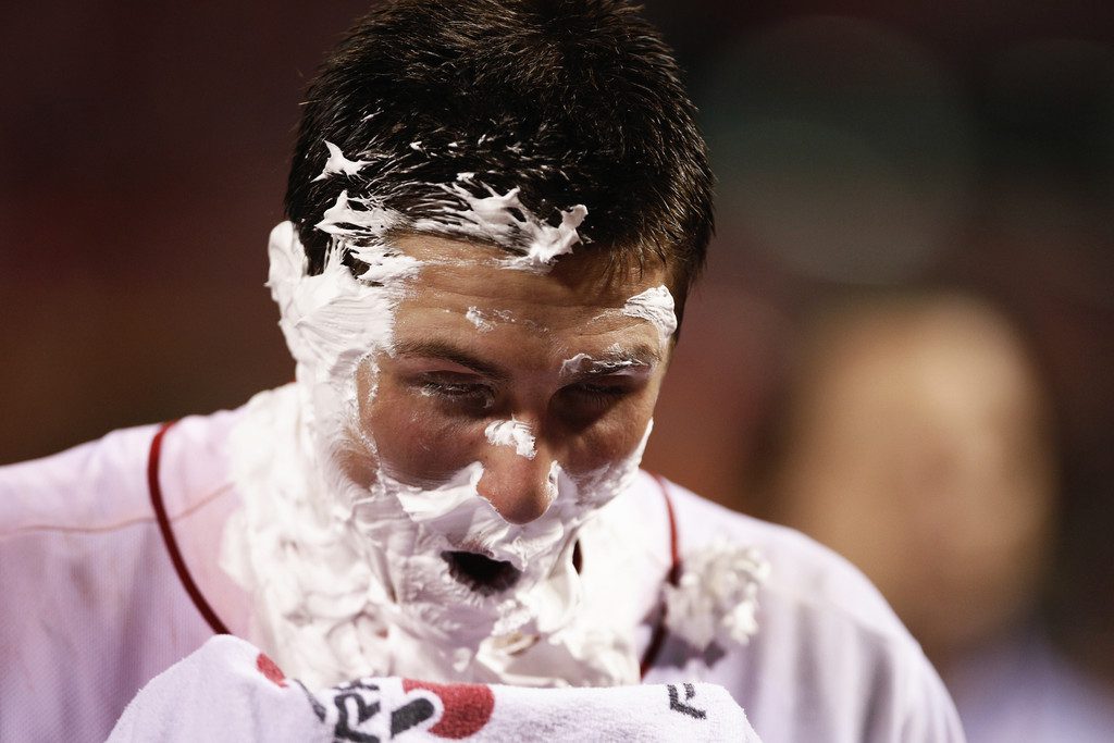 Homer Bailey, drenched in Gatorade and covered with shaving cream.