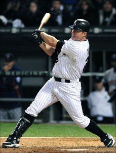 Jim Thome swings and connects.