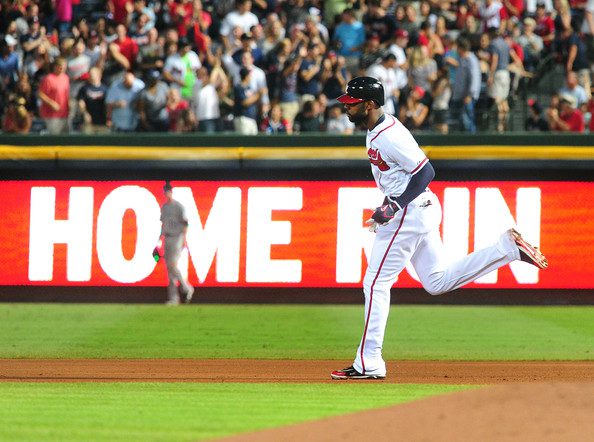 Jason Heyward rounds the bases after hitting a home run.