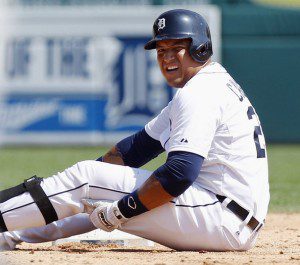 Miguel Cabrera sitting on the ground in pain.