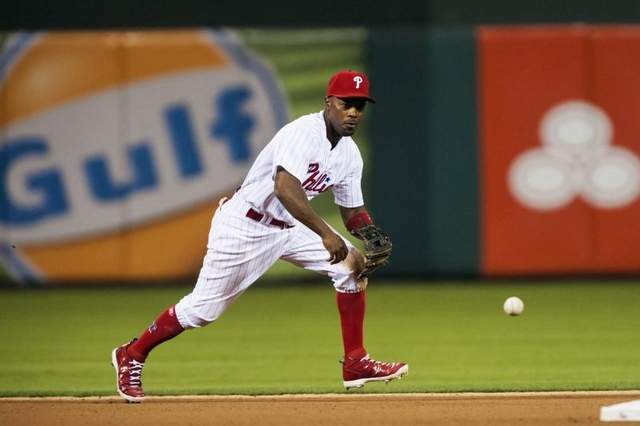 Jimmy Rollins gets ready to field a ground ball.