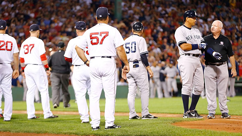 A-Rod is attended to by a trainer after being hit by a pitch.
