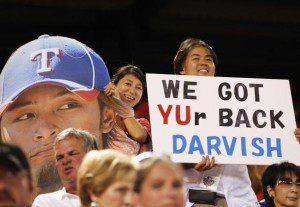 Yu Darvish fans hold up a sign.